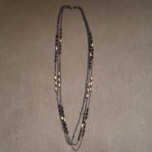 Long multi strand necklace